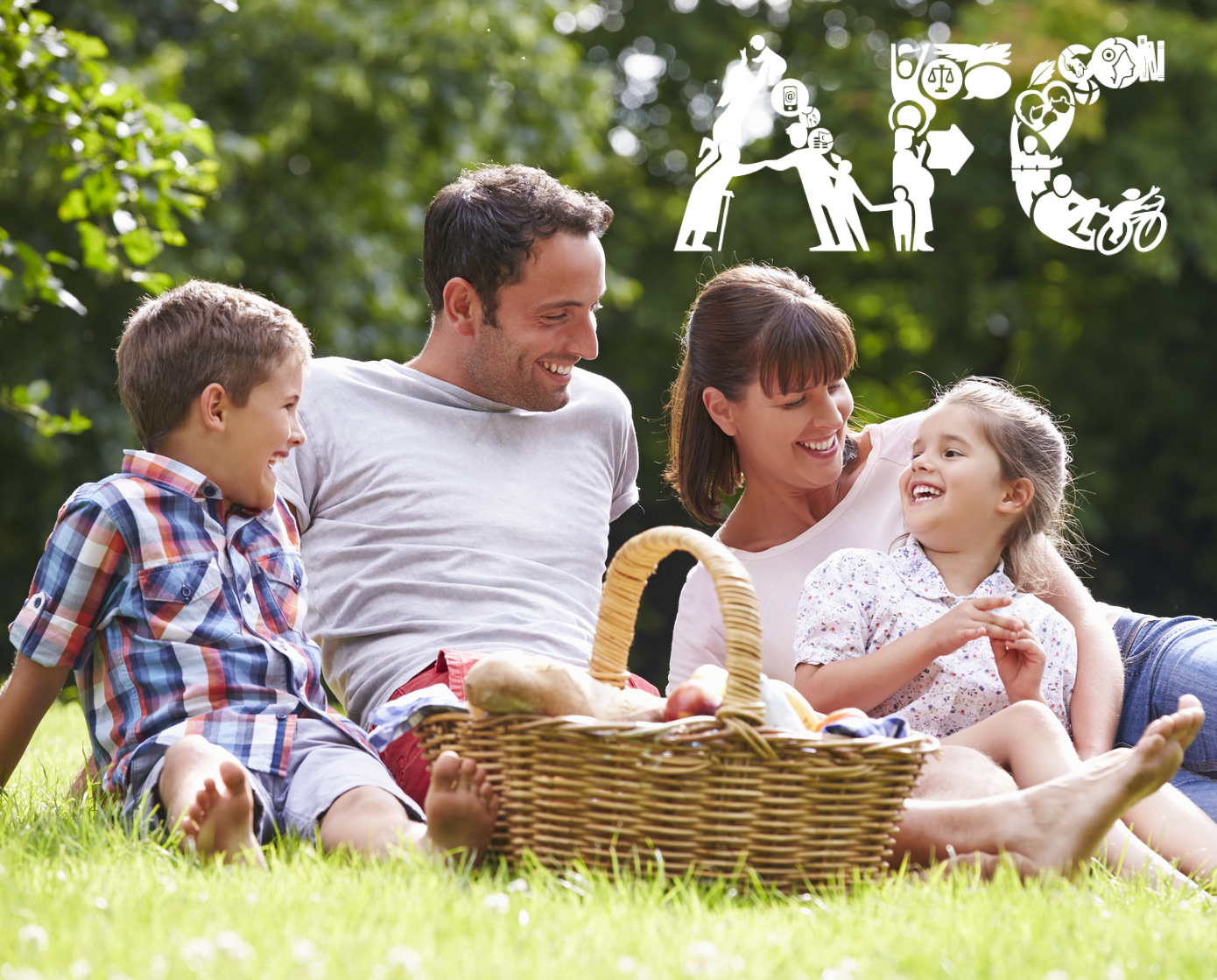 Family Enjoying Summer Picnic In Countryside